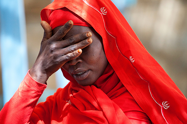 19 January 2012. El Fasher:  A woman from Kassab camp for Internal Displaced Persons (IDP), in Kutum (North Darfur), shows her sorrow for the increase of rapes in the area. She addressed to the UNAMID Joint Special Representative Ibrahim Gambari and asked him to assure their protection. More than 25,000 IDPs live in the camp and UNAMID troops organize patrols every day to control the area. 
Photo by Albert Gonzalez Farran - UNAMID